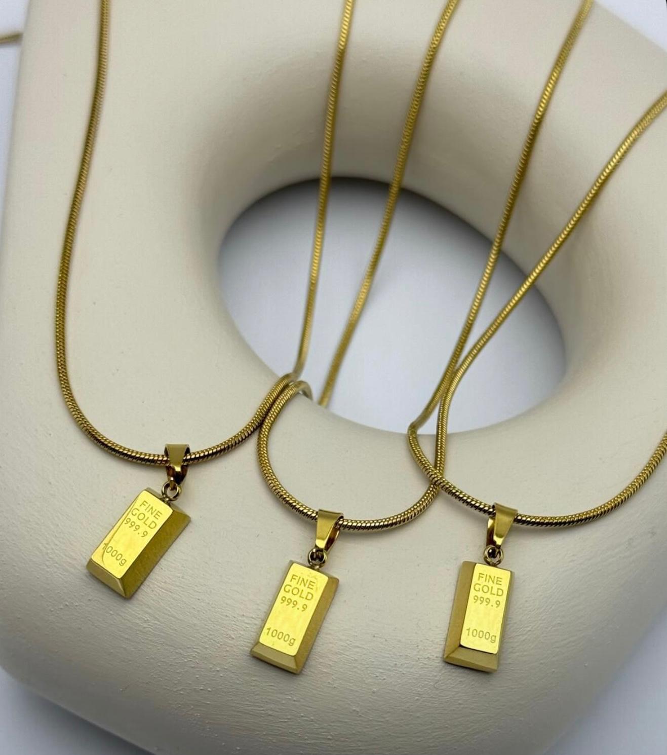 Çelik külçe altın kolye